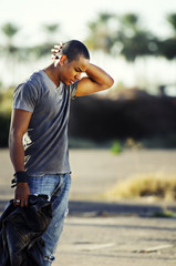 Young man with head down