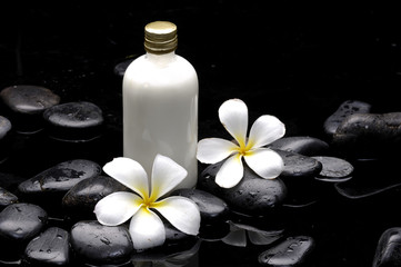 Obraz na płótnie Canvas Spa still life with bottle of essential oil