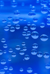 Underwater light and flowing bubbles, abstract background