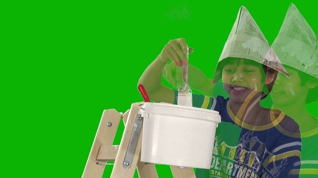 child helping paint his room