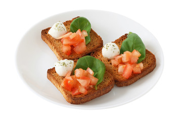 toasts with mozzarella, basil and tomato