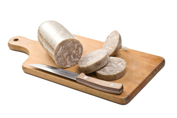 headcheese sausage on wooden board