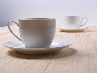 White coffee cup on wood