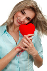 attractive smiling woman with heart on white background