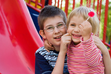 children on playground - obrazy, fototapety, plakaty