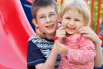 children on playground - obrazy, fototapety, plakaty