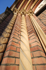 Old fashioned pillars and brick wall