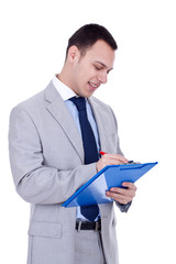 business man writing on clipboard