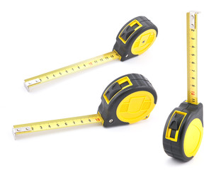 Yellow tape measure with soft shadow