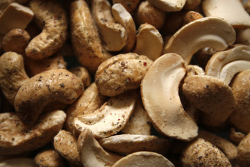 image of cashews covered in sea salt and cracked black pepper