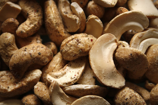 Image Of Cashews Covered In Sea Salt And Cracked Black Pepper