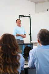 Group of people attending business conference