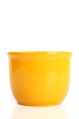 Colored empty flower pot, isolated on white background © Jag_cz