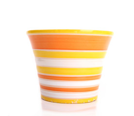 Colored empty flower pot, isolated on white background © Jag_cz
