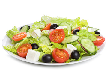 Fototapeta na wymiar salad with vegetables and greens