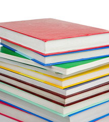 pile of new books isolated on white