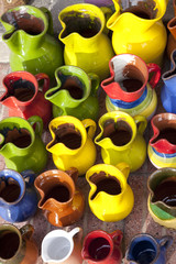 Fototapeta premium Souvenir jugs for sale outside shop in Majorca, Spain