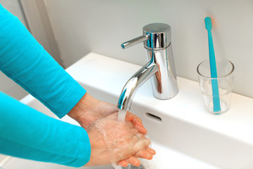 Washing hands in the bathroom most effective hygiene