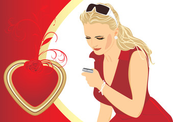 Beautiful woman with a mobile telephone. Valentines day