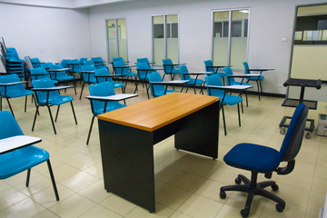 Empty room wth many armchairs