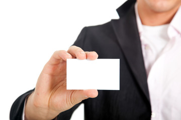 Businessman holding a businesscard isolated on white