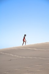 side woman on great sand mountain