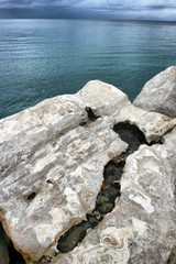 White stone and sea