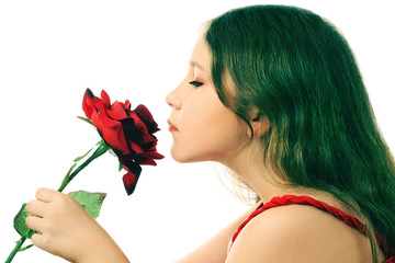 Profile of inspired girl child with flower.