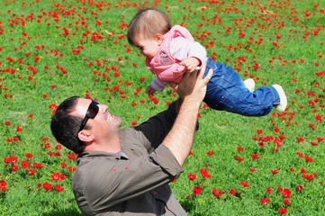 Father and Daughter in Flowering Field