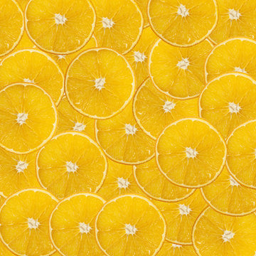 Oranges arraged as juicy background