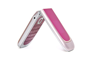 мобильный телефон розового цвета на белом фоне.