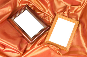 Picture frames on the color satin background