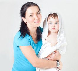 The woman with the child in a towel