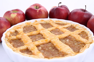 Apple Pie and some red apples on white background