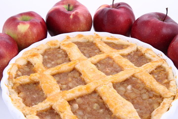 Apple Pie and some red apples on white background