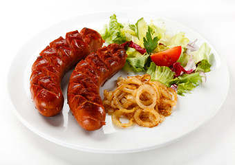 Grilled sausages and vegetables