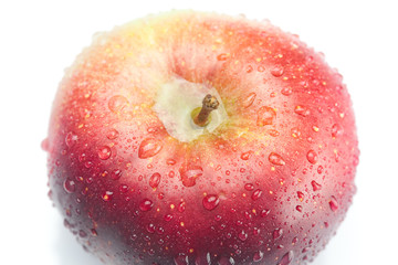red apple with water drops isolated on white