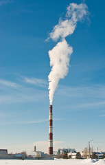 Smokestack over blue sky. Climate warming concept