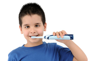 Cute boy brushing teeth isolated on white background.