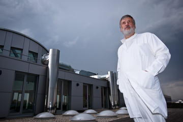 Fototapeta premium scientist/doctor standing on the roof of the research centrum