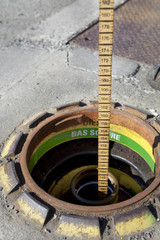 Measuring gasoline inventory with a dip stick