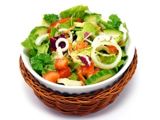 A mixed salad in a basket on a white background