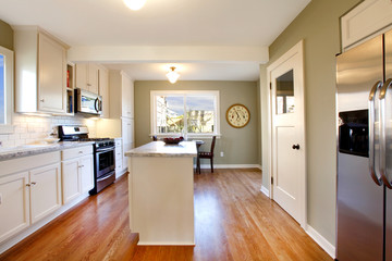 White and green kitchen with luxury design