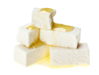 Feta cheese cubes with olive oil drops