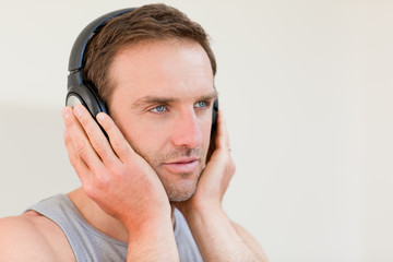 Handsome man listening to some music