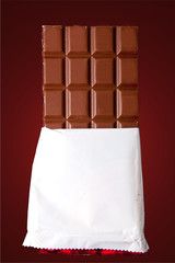 chocolate in bar with open white cover