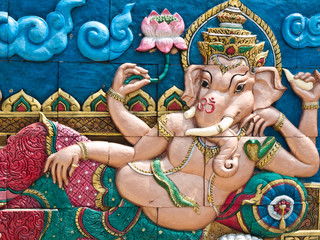 Golden Hindu God Ganesh on wall