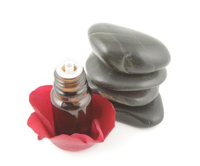 rose essential oil and spa stones