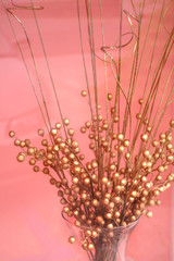 Vase of Gold Berries on Pink