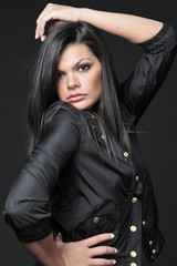 Fototapeta na wymiar Young attractive woman with long black hair.